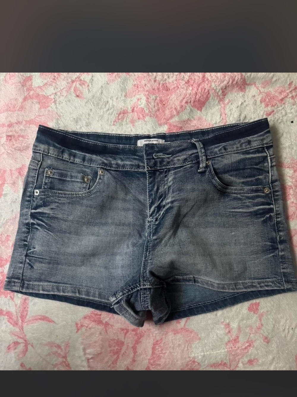 Women’s Low-Rise Distressed Denim Shorts - Faded Blue